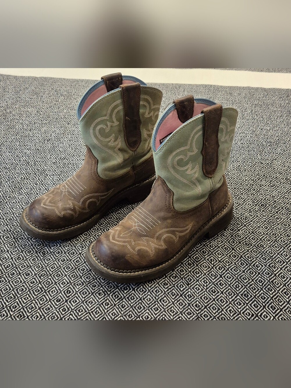 Ariat Brown and Green Women's Fatboy boots.